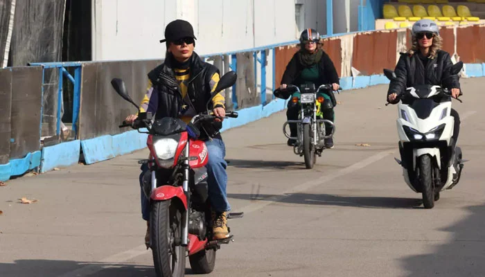 Iran’s women bikers take the road despite legal, social obstacles