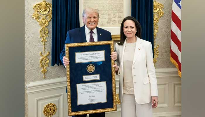 Trump accepts Nobel medal from Venezuelan opposition leader Machado