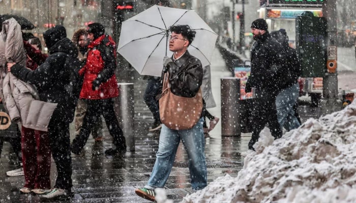 Powerful winter storm shuts schools, disrupts travel across US Northeast
