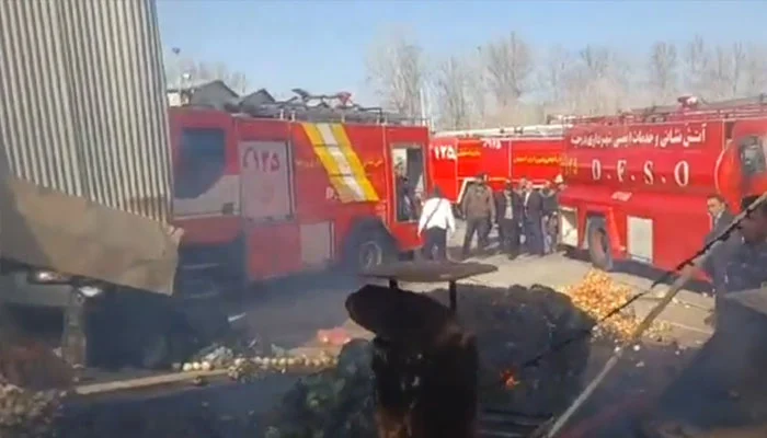 Iranian military helicopter crashes into fruit market, four dead