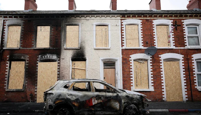 Knife attack victim’s family calls for calm after anti-immigrant violence in Belfast