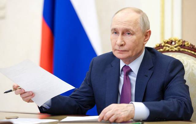 Putin faces rival visions of war and peace at Russia’s ‘Davos’